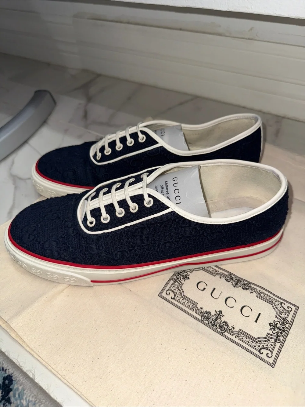 Gucci Black GG Canvas Low-Top Sneakers with White Trim and Red Stripe